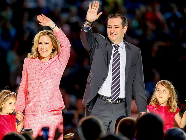 Sen. Ted Cruz, second from right, R-Texas, his wife Heidi, and their two daughters Catherine, left, 4, and Caroline, 6, wave on stage after he announced his campaign for president, Monday, March 23, 2015.