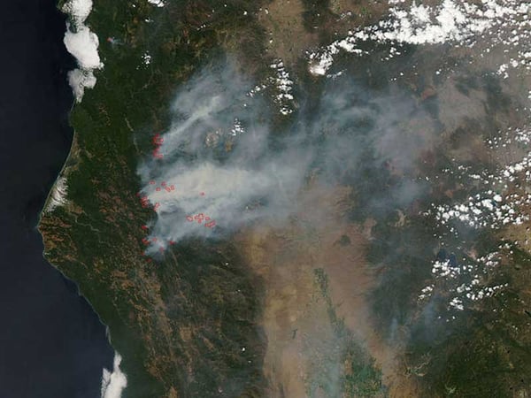 A photograph from the International Space Station showing smoke from the wildfires burning in northern California on Aug. 6, 2015. 