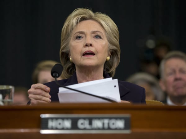 Democratic presidential candidate, former Secretary of State Hillary Rodham Clinton looks toward the dais as she settles into her seat on Capitol Hill in Washington, Thursday, Oct. 22, 2015, prior to testifying before the House Benghazi Committee.