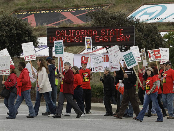 Faculty and students of California State University East Bay picket the entrance to the campus as part of a strike Thursday, Nov. 17, 2011 in Hayward, Calif. Hundreds of California State University faculty members strike on two CSU campuses.
