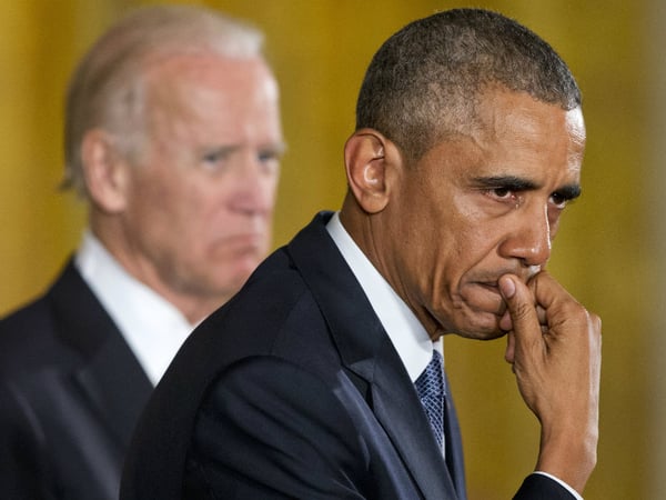 An emotional President Barack Obama, joined by Vice President Joe Biden, pauses as he recalled the 20 first-graders killed in 2012 at Sandy Hook Elementary School, while speaking in the East Room of the White House in Washington, Jan. 5, 2016.