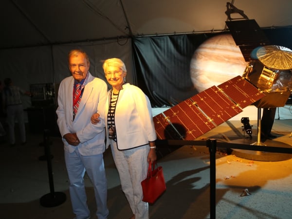 Dr. Tobias Owen and his wife Natasha with the JUNO model. 
