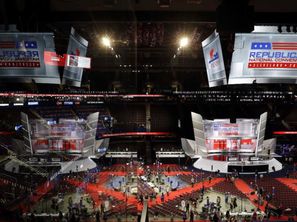 Workers place a sign as they prepare at Quicken Loans Arena for the Republican National Convention, Sunday, July 17, 2016, in Cleveland. 