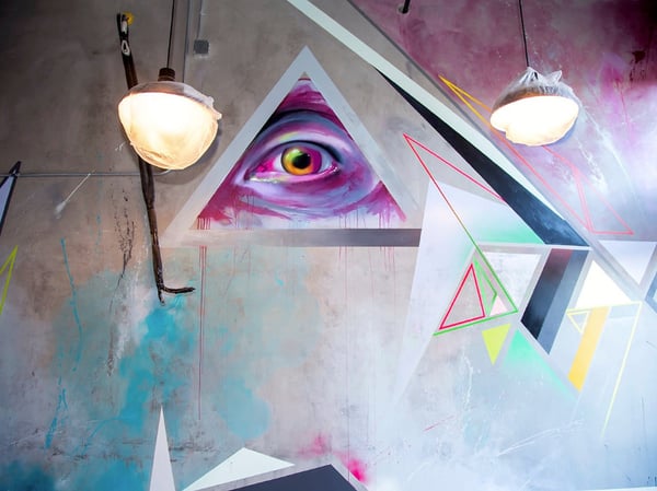 Muralist Irubiel Moreno's work in the Warehouse Artist Lofts. Moreno is one of 12 artists participating in a week-long mural festival taking place this month. 