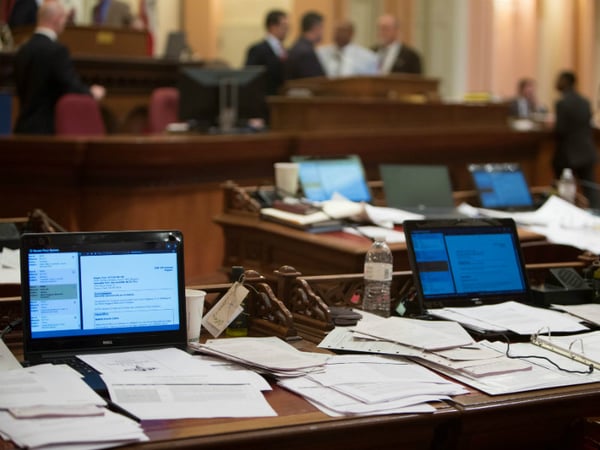 Bills stack up on the desks of the California state Senate on the last night of the legistlative session, August 31, 2016. 