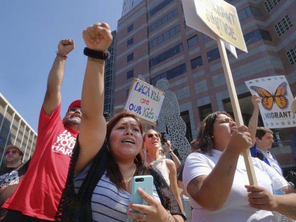 Kimberly Valerian joins supporters of the Deferred Action for Childhood Arrivals or DACA, during a protest at the Royal Federal Building in downtown Los Angeles on Tuesday, Sept. 5, 2017. 