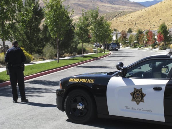Reno police block off the street a half-block away from where authorities searched a home owned by Stephen Paddock on Monday, Oct. 2, 2017, in Reno, Nev. Paddock opened fire on a crowd at a country music concert on the Las Vegas Strip on Sunday. 
