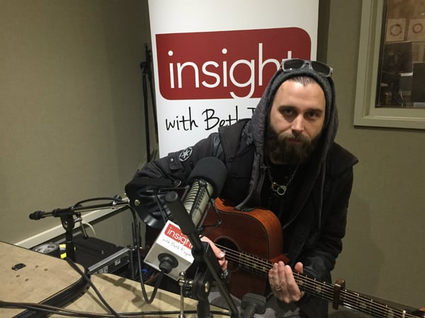 Kris Adams, the lead singer and guitarist for Life in 24 Frames.