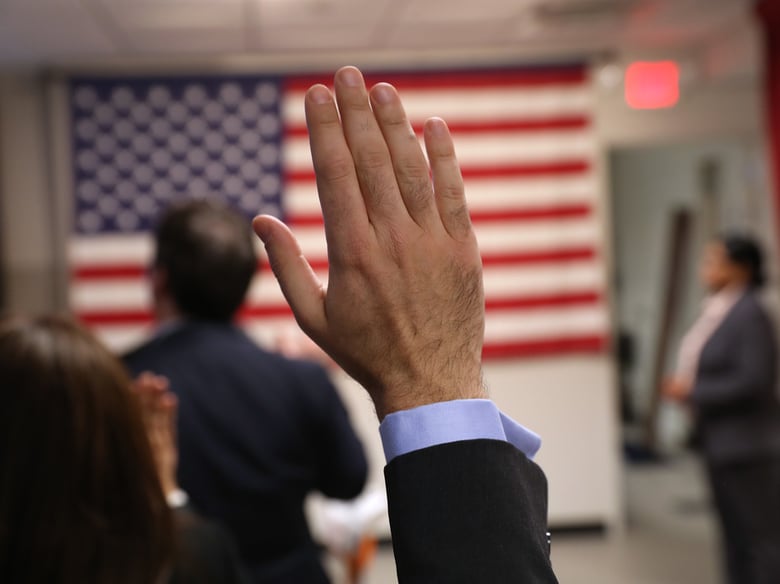 Immigrants take the oath of allegiance to the United States at a naturalization ceremony on Feb. 2 in New York City.
