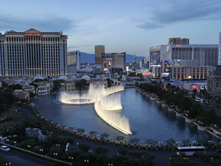 In this April 4, 2017, file photo, the fountains of Bellagio erupt along the Las Vegas Strip in Las Vegas. The union representing hotel workers in Las Vegas will ask casino-resort operators to give every housekeeper a 'panic button.'