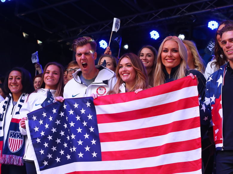 Bobsledder Elana Meyers Taylor, snowboarder Alex Deibold, skier Lindsey Vonn, skier Gus Kenworthy and members of Team USA pose for a photo during the 100 Days Out 2018 Pyeongchang Winter Olympics Celebration.