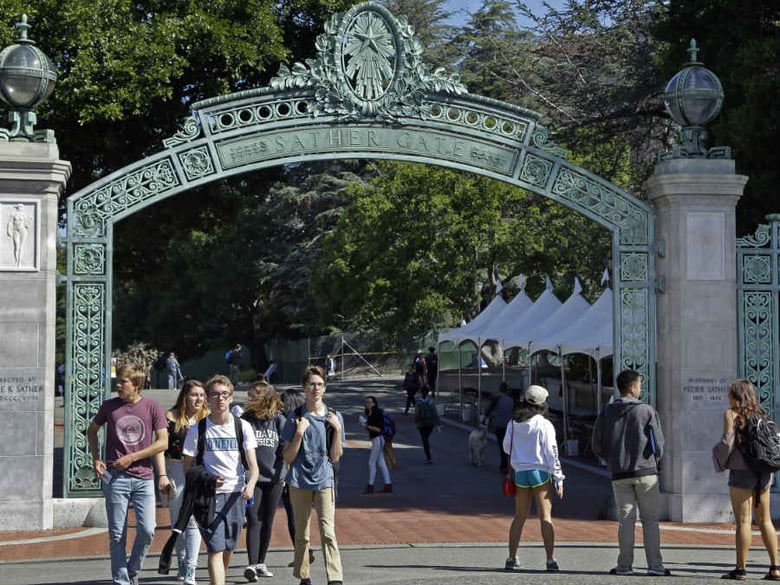 FILE - In this April 21, 2017, file photo, students walk past Sather Gate on the University of California, Berkeley campus in Berkeley, Calif. 