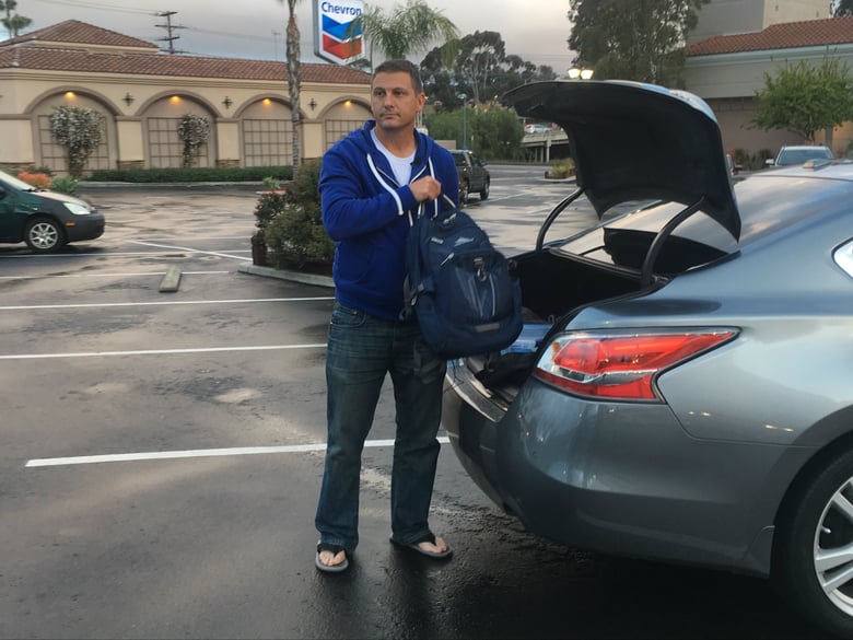 After finishing his first Uber/Lyft driving shift, Chad Bordes heads to the gym to shower and change before starting his next job selling cars online, March 15, 2018. 