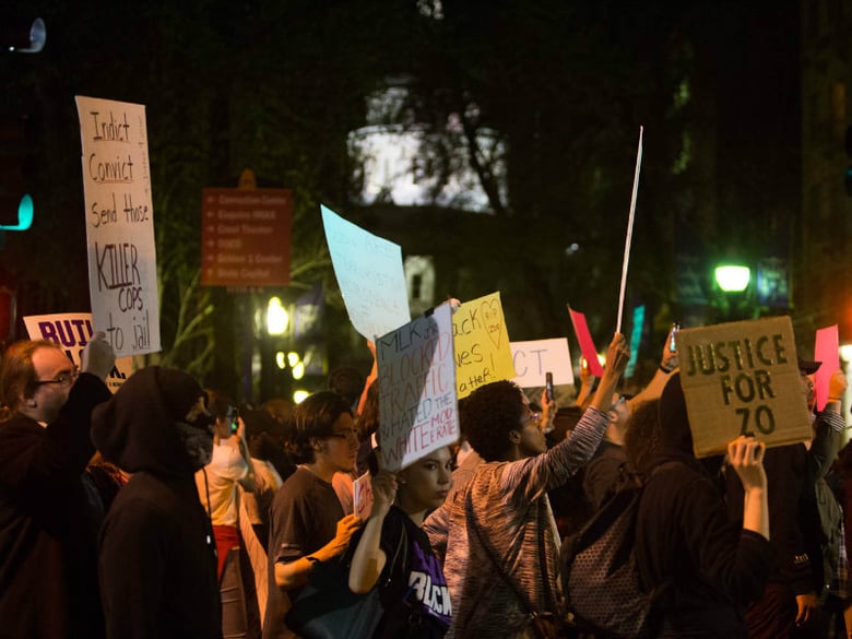 Protesters march for justice for Stephon Clark, killed by Sacramento police on March 18. Local activists are skeptical about whether justice will come and have asked for a police commission with more power to recommend disciplinary actions.