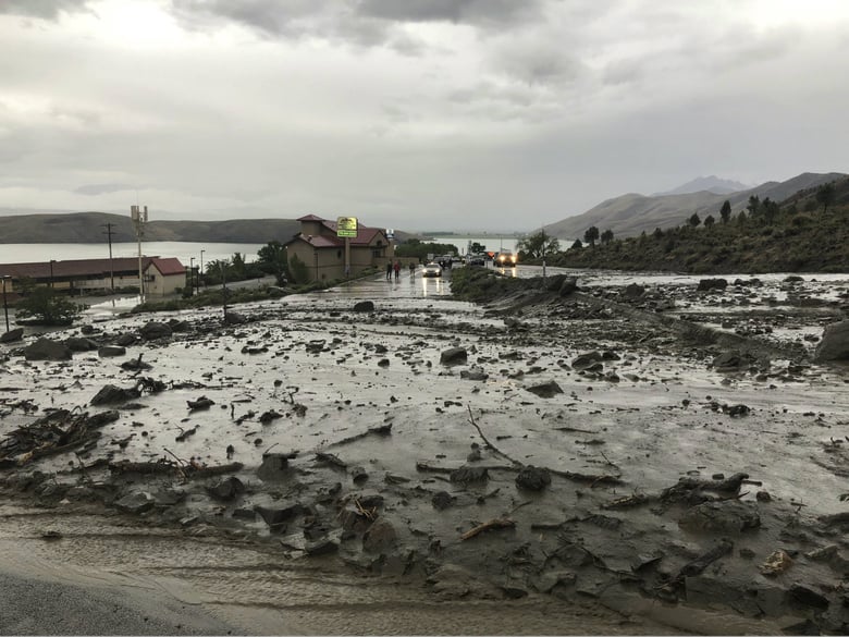 This image provided by Department of Public Safety/Nevada Highway Patrol Northern Command West shows mudslides on U.S. Highway 395 in Douglas County, Nev., north of the Nevada-California state line, Monday, May 21, 2018. 