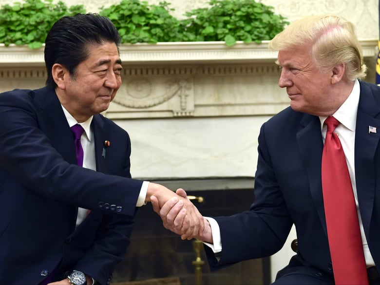 President Donald Trump shakes hands with Japanese Prime Minister Shinzo Abe in the Oval Office of the White House in Washington, Thursday, June 7, 2018. 