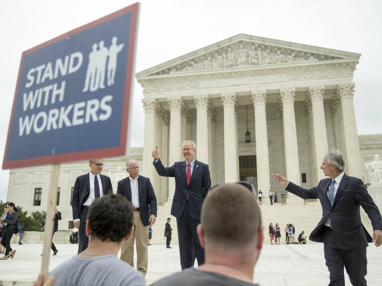 The Supreme Court ruled Wednesday that government workers can't be forced to contribute to labor unions that represent them in collective bargaining, dealing a serious financial blow to organized labor.