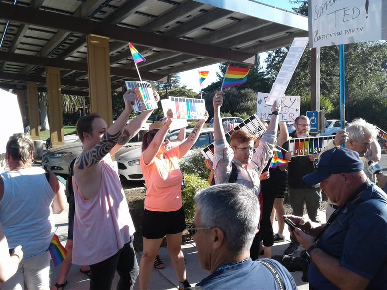 Demonstrators rally outside the Dixon City Council meeting July 10, 2018 in protest of Vice Mayor Ted Hickman, who recently wrote a controversial column in Dixon’s Independent Voice newspaper in which he called for "straight pride" month.