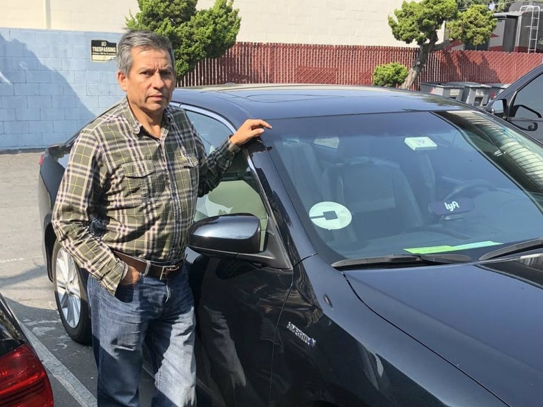 Edhuar Arellano has been driving for Uber and Lyft for four years. He says the companies should make drivers employees.