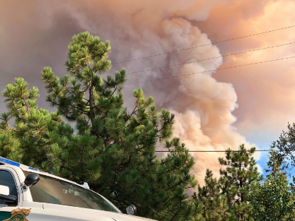 A smoke column from the North Fire off Interstate 80 near Emigrant Gap.