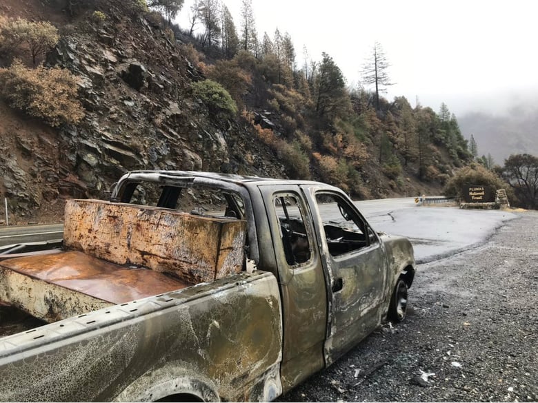 Storms are causing mudslides and debris flows clogging drains along Highway 70 where the Camp Fire burned near Pulga in Butte County.