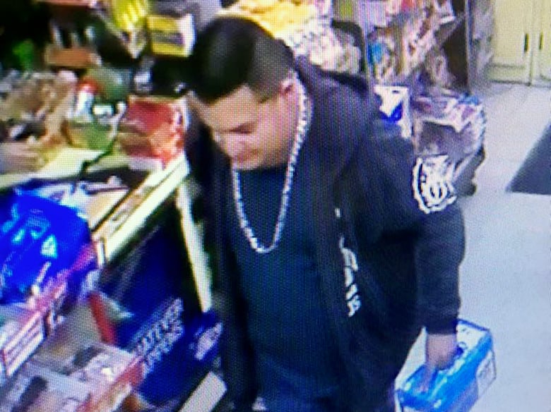 This Wednesday, Dec. 26, 2018 image from a surveillance camera video and provided by the Stanislaus County Sheriff's Department shows a suspect police are searching for in connection to the fatal shooting of an officer.