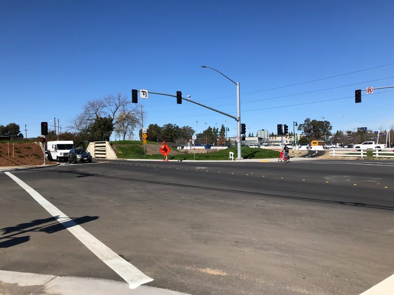 View of the intersection facing the Sac State campus.
