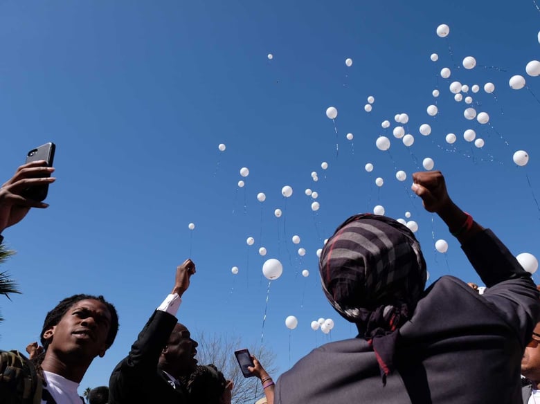 Balloons are released at a memorial at Genesis Church in Meadowview on the anniversary of Stephon Clark's death.