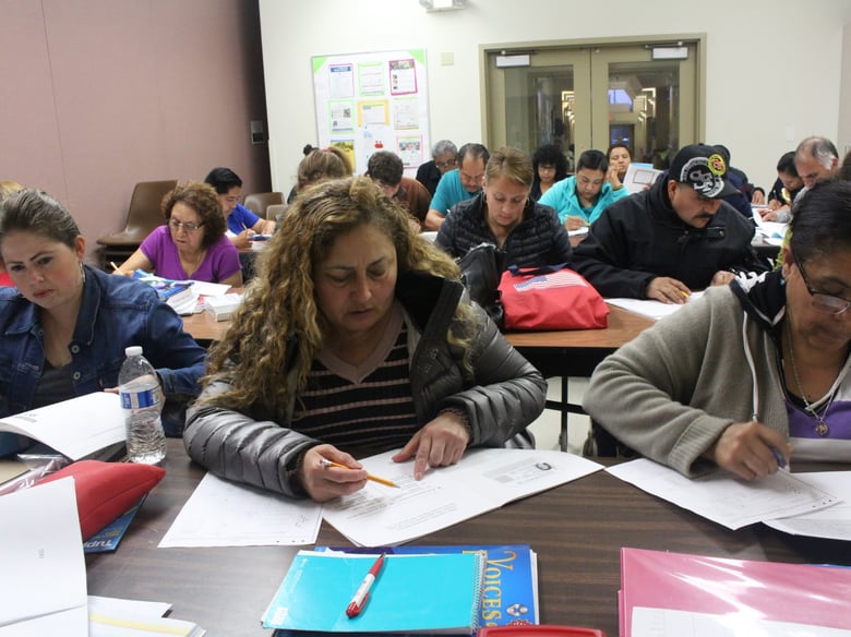 Martha Franco, Delfina Gonzalez de Monteroso and Angelina Jimenez (r) study a civics lesson for immigrants seeking U.S. citizenship at the Fair Oaks Community Center in Redwood City, Calif on March 22, 2018.