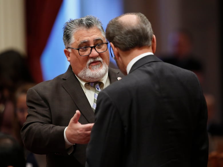 State Sen. Anthony Portantino, D-La Canada Flintridge, left, talks with Sen. Jerry Hill, D-San Mateo, right, during the Senate session at the Capitol Thursday, May 16, 2019, in Sacramento, Calif.
