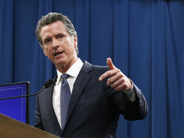 Gov. Gavin Newsom discusses his revised 2019-2020 state budget during a news conference on May 9, 2019. Some lawmakers and advocates are raising doubts about his plan to shore up Obamacare with a tax penalty on people who don't buy insurance.