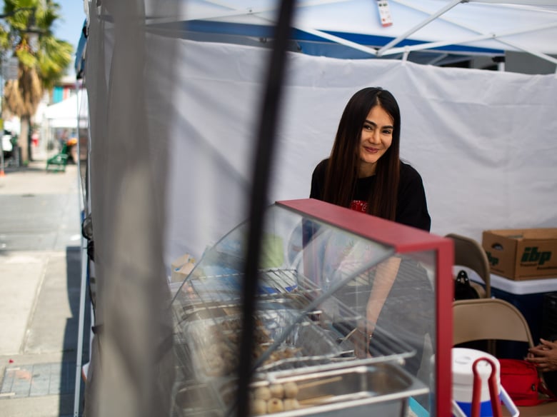 Iririn Srirada sells papaya salad and other items at the East Hollywood Farmers’ Market, June 6, 2019.