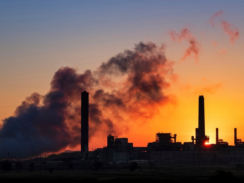 In this July 27, 2018, file photo, the Dave Johnson coal-fired power plant is silhouetted against the morning sun in Glenrock, Wyo.