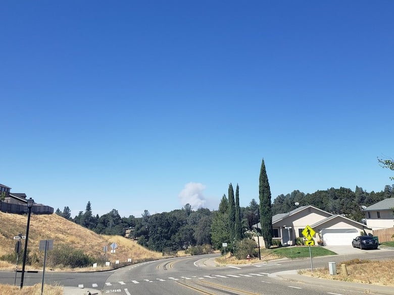 A wildfire burns near Cool in El Dorado County.