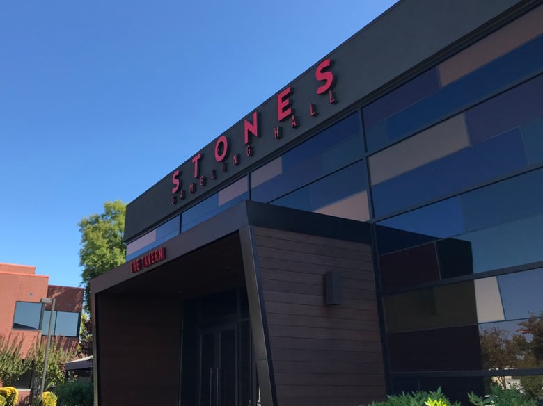 The Department of Justice is investigating a professional poker player for hundreds of thousands of dollars in Texas Hold 'em wins at Stones Gambling Hall in Citrus Heights