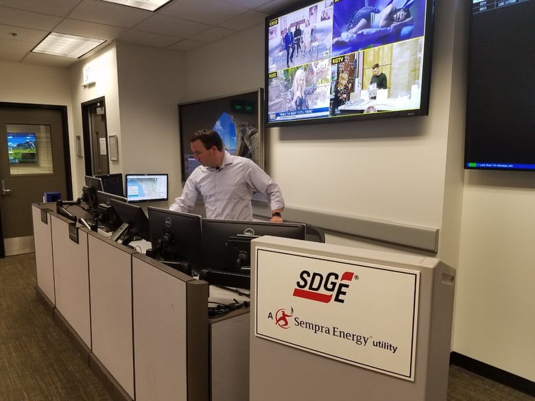 Brian D'Agostino, SDG&E’s Director of Fire Science and Climate Adaptation, scans the monitors at the utility’s operations center, Oct. 18, 2019.