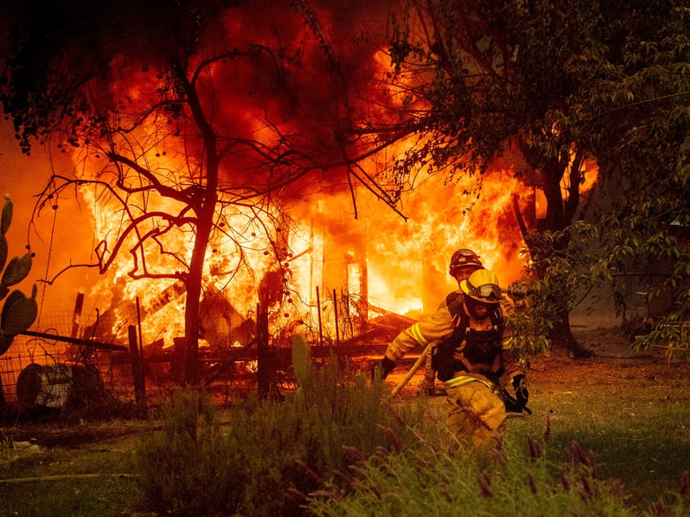 Flames from the Kincade Fire consume a home in the Jimtown community of unincorporated Sonoma County, Calif., on Thursday, Oct. 24, 2019.