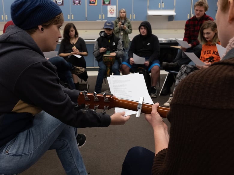Art therapist Jessie Mercer and Music Therapist Erin Haley play an original song written by the class about their experiences with the Camp Fire.