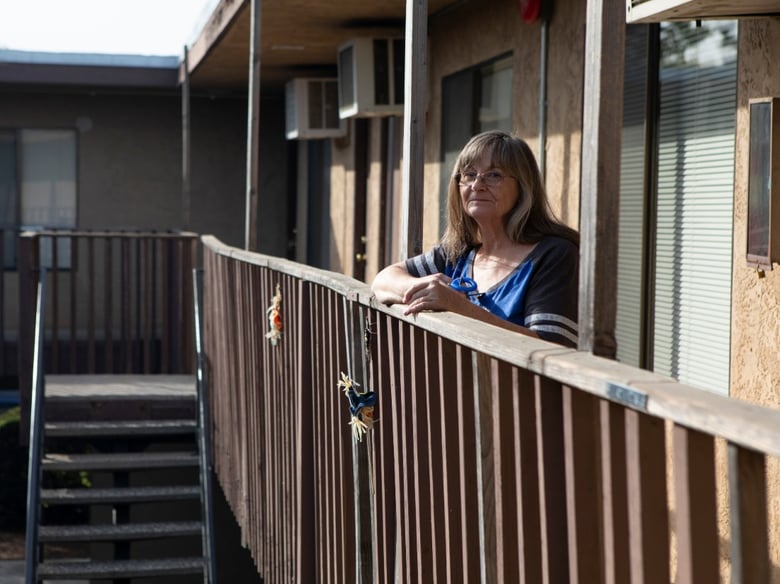 Nancy Rich outside of her apartment in Marysville, CA. Rich misses the community from her housing complex in Paradise and feels lonely in her current living situation.