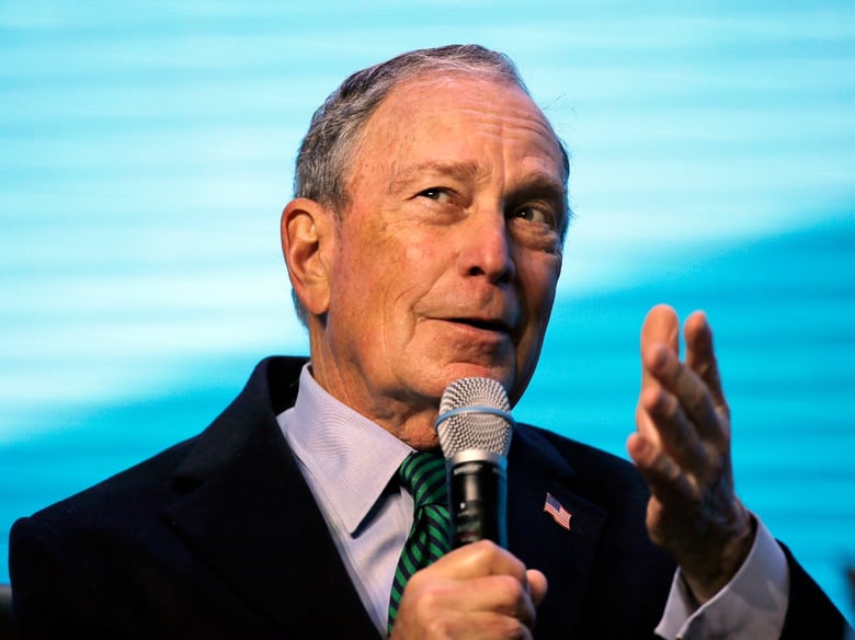 Democratic Presidential candidate and former New York City Mayor Michael Bloomberg gestures while taking part in an on-stage conversation with former California Gov. Jerry Brown at the American Geophysical Union fall meeting Wednesday, Dec. 11, 2019.