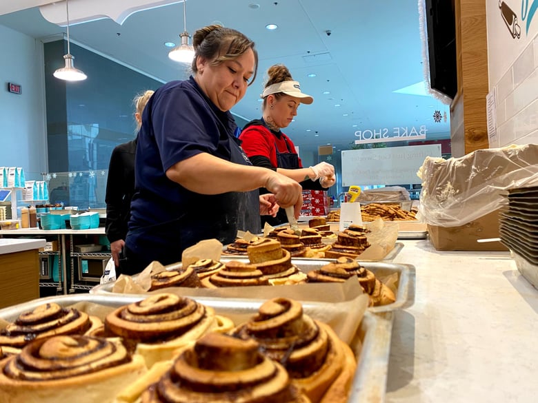Arden Fair Cinnabon Manager Sonia Figueroa gets ready to glaze rolls with cream cheese frosting.