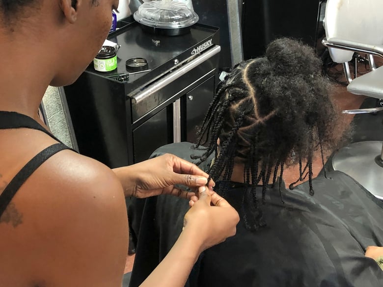 Shana Bonner, left, styles the hair of Pho Gibson at Exquisite U hair salon in Sacramento, Calif., Wednesday, July 3, 2019.