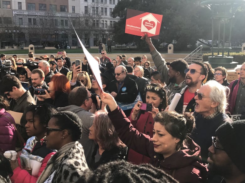 Demonstrators for and against SB50, a controversial California housing bill, gather in Oakland at a press conference for the reintroduction of the measure.