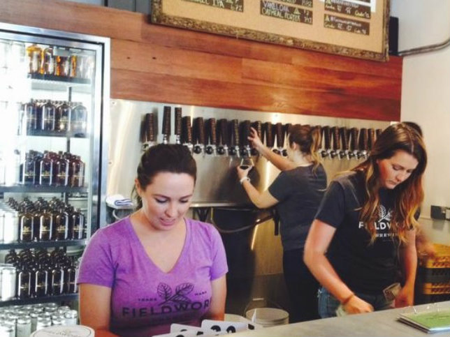 Employees at Fieldwork Brewing's existing taproom in Midtown Sacramento. The Berkeley-based craft brewery will expand from 1,400 to 4,900 square feet, with an address of 1805-1809 Capitol Ave.