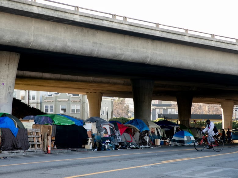 A tent encampment off of Grand Avenue in Oakland. Homelessness has soared in California, and a new poll shows voters now list it as their top concern.
