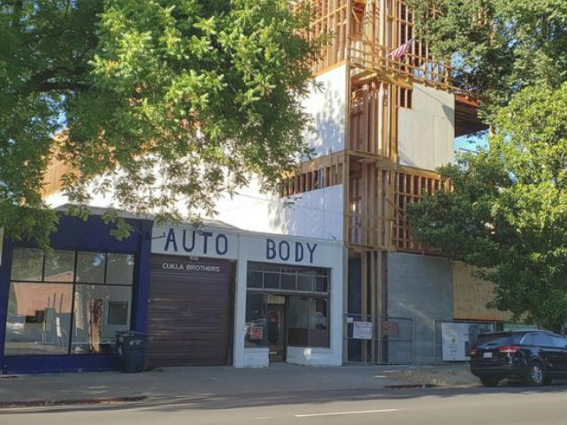 A former auto body shop in midtown Sacramento could be the site of a new project led by Henry de Vere White of de Vere's Irish Pub.