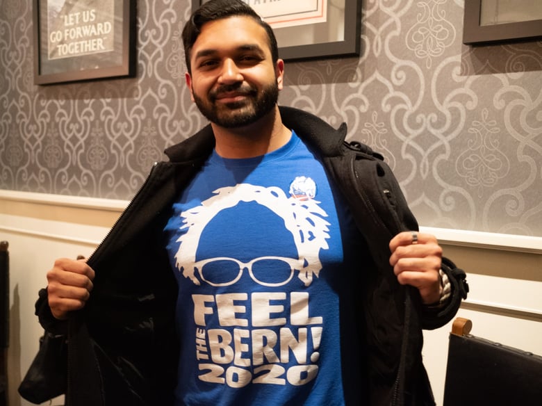 Talha Javed shows his support for Bernie Sanders at an election returns watch party in Downtown Sacramento on March 3, 2020.