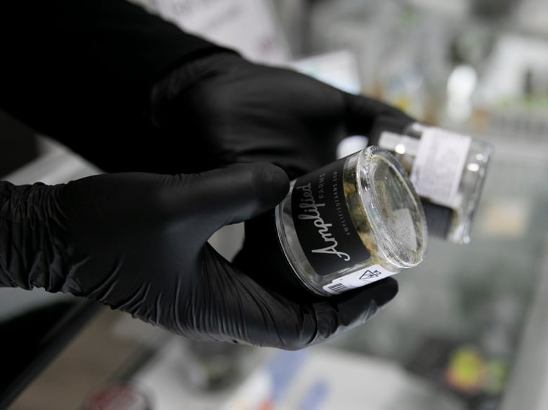 Jars of marijuana at a Berkeley dispensary on March 21. Gov. Gavin Newsom has deemed cannabis an essential business as Californians shelter in place.