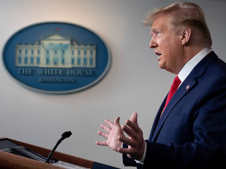 President Trump speaks at the White House Saturday. Governors say they need help to increase testing capacity before considering easing social distancing restrictions.