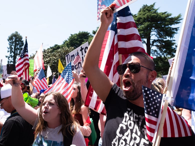 People gathered at the California Capitol to protest the state's stay-at-home order to prevent the spread of COVID-19 on Friday, May 1, 2020.